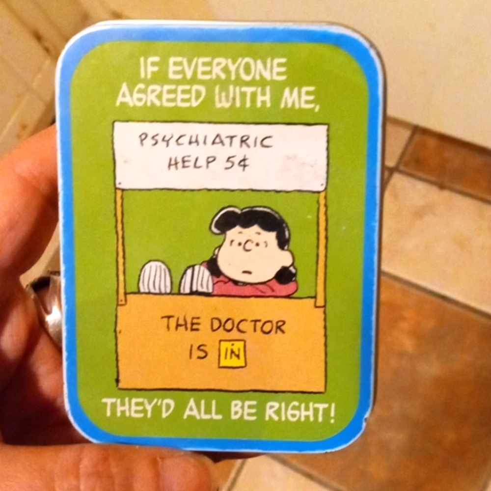 Peanuts Lucy "the doctor is in" vintage tin